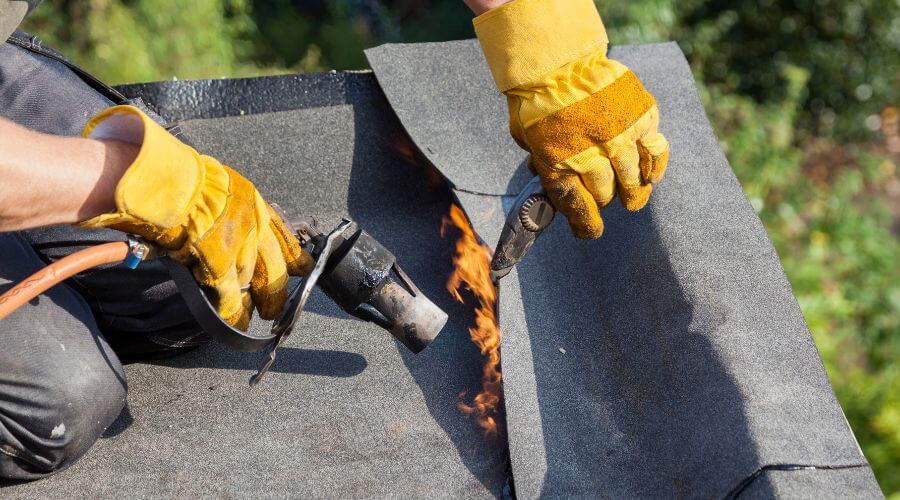 Professional gutter cleaning in De Soto, IA